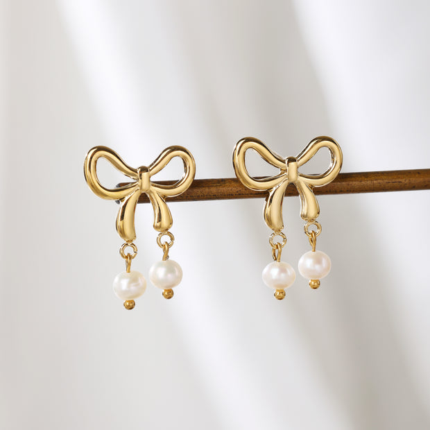 Sphere&Style Stylish Pearly Bow Drop Earrings