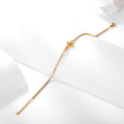 Sphere&Style Cross Bracelet