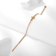 Sphere&Style Cross Bracelet