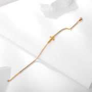 Sphere&Style Cross Bracelet