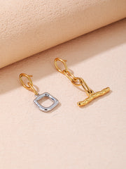 Sphere&Style Two Tones letters Earrings (T-O)