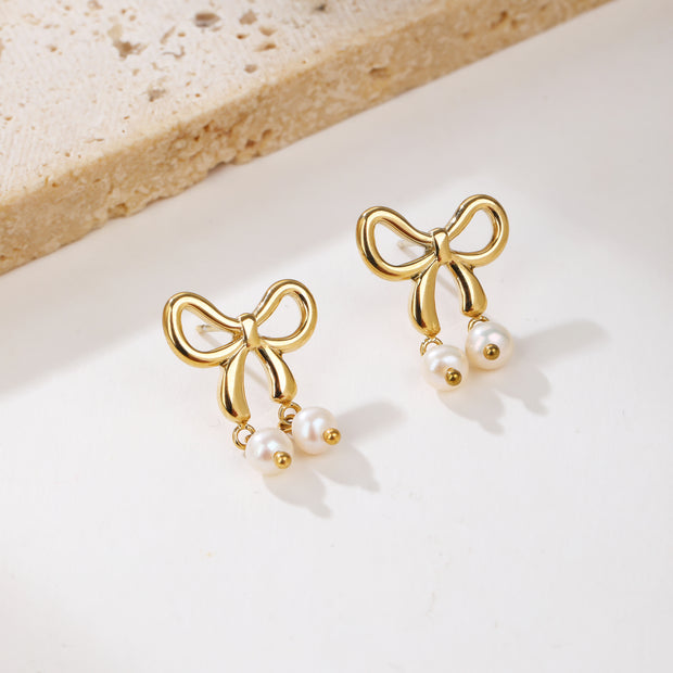 Sphere&Style Stylish Pearly Bow Drop Earrings