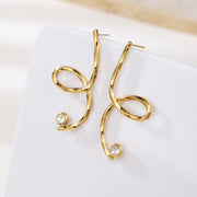 Sphere&Style Long Snake With Drop Diamond Earrings