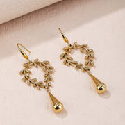 Sphere&Style Golden Leaf Earrings With Teardrop Pendant