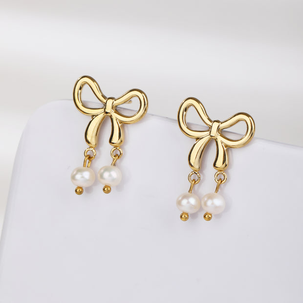 Sphere&Style Stylish Pearly Bow Drop Earrings