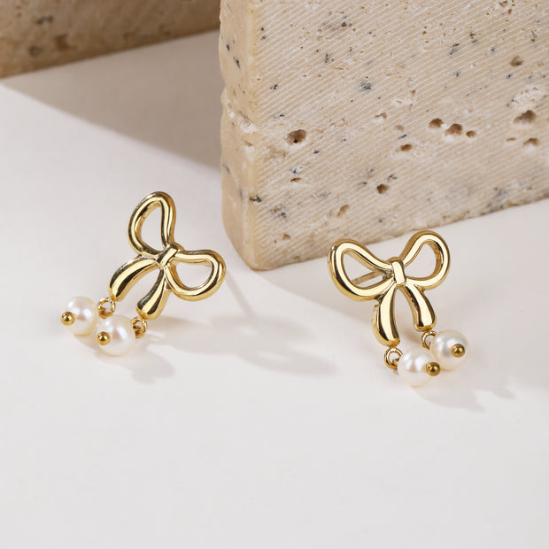 Sphere&Style Stylish Pearly Bow Drop Earrings